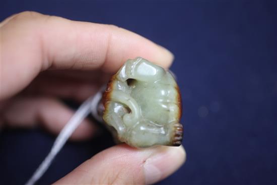A Chinese greenish-yellow and russet jade group of a bear and cub, Han dynasty or later 4.5cm